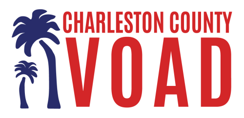 Charleston County VOAD logo. Charleston County VOAD is in red, and there are two dark blue palmetto trees next to it