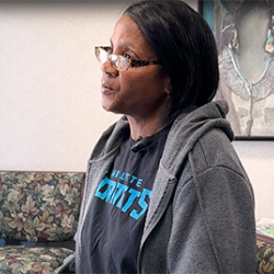 Saundra telling her story in front of the camera.